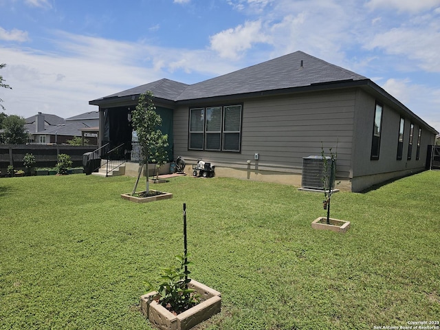 111 Lone Fls, Universal City, TX 78148 - rear view of property featuring a lawn