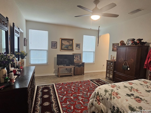 111 Lone Fls, Universal City, TX 78148 - bedroom with wood finished floors and a ceiling fan