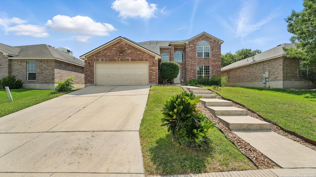 2166 Jolie, New Braunfels, TX 78130 - traditional-style house featuring a garage, a front yard, driveway, and brick siding
