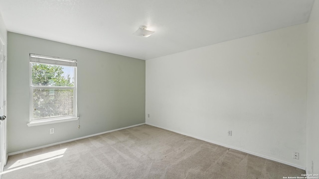 2166 Jolie, New Braunfels, TX 78130 - empty room with carpet floors and baseboards
