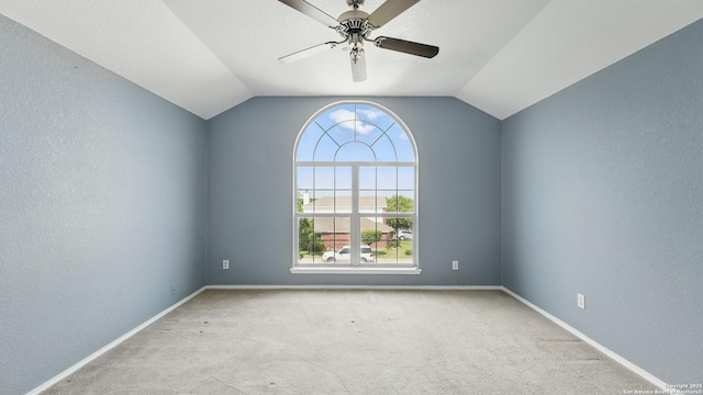 2166 Jolie, New Braunfels, TX 78130 - carpeted spare room featuring vaulted ceiling, ceiling fan, and a textured wall