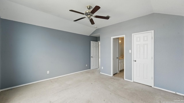 2166 Jolie, New Braunfels, TX 78130 - unfurnished bedroom with lofted ceiling, light colored carpet, ensuite bathroom, and a ceiling fan