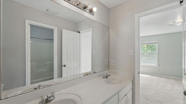 2166 Jolie, New Braunfels, TX 78130 - full bath featuring double vanity and baseboards