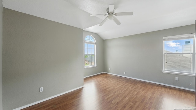 2166 Jolie, New Braunfels, TX 78130 - unfurnished room featuring ceiling fan, wood finished floors, and lofted ceiling