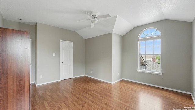 2166 Jolie, New Braunfels, TX 78130 - empty room featuring a ceiling fan, lofted ceiling, and wood finished floors