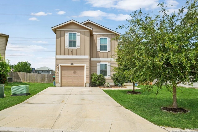 5907 Kendall, San Antonio, TX 78244 - view of front facade with an attached garage, driveway, and board and batten siding