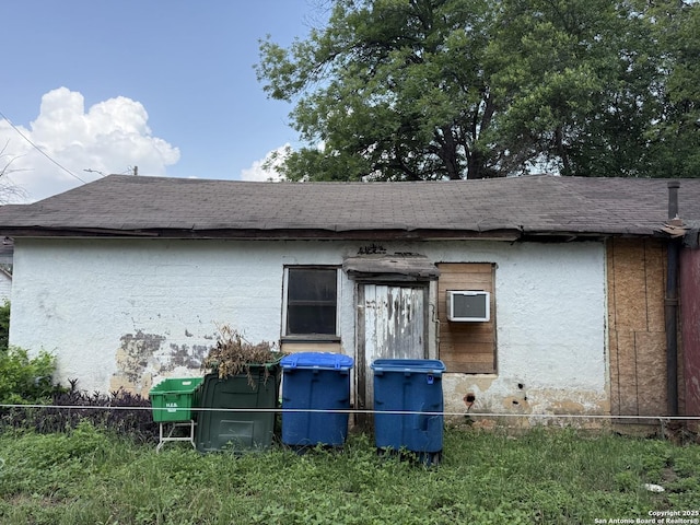 330 Madero, San Antonio, TX 78207 - back of property featuring a shingled roof and stucco siding