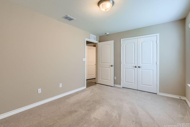 3354 Blossom Row, San Antonio, TX 78253 - unfurnished bedroom with light colored carpet and a closet
