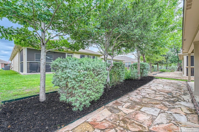 3354 Blossom Row, San Antonio, TX 78253 - view of green lawn featuring a patio