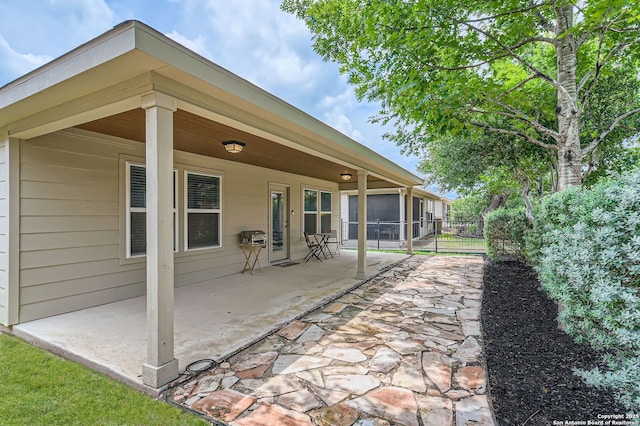 3354 Blossom Row, San Antonio, TX 78253 - view of patio featuring a sunroom