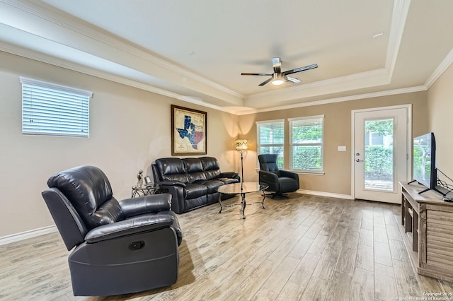 3354 Blossom Row, San Antonio, TX 78253 - living room featuring a raised ceiling, light wood-type flooring, ceiling fan, and crown molding