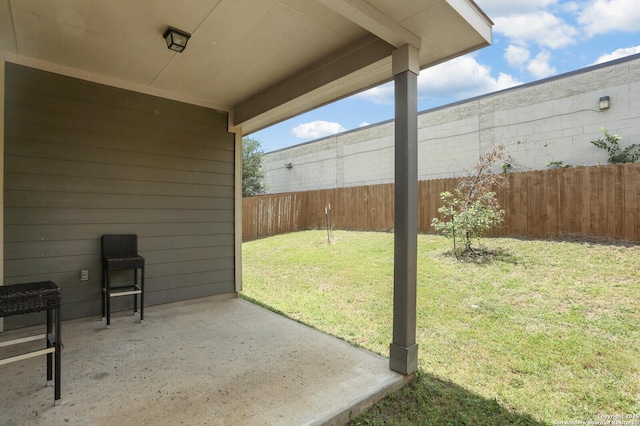 7883 Abbey, San Antonio, TX 78218 - fenced backyard with a patio area