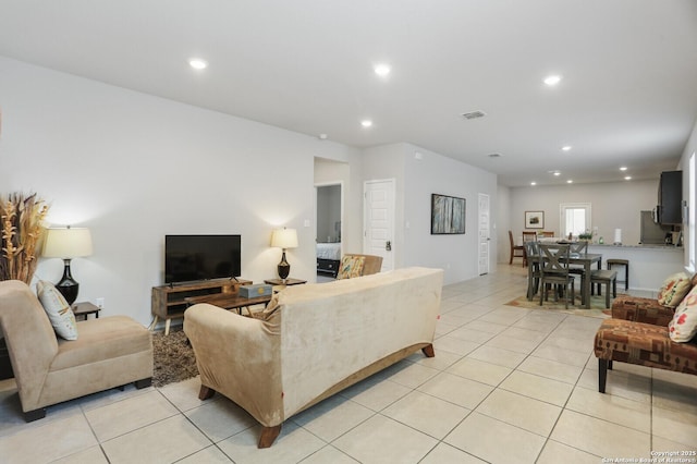 7883 Abbey, San Antonio, TX 78218 - living room with light tile patterned flooring and recessed lighting