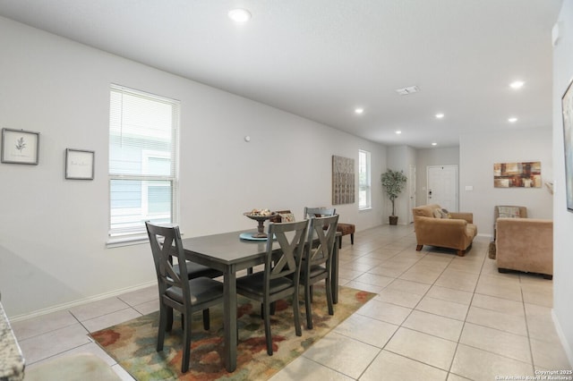 7883 Abbey, San Antonio, TX 78218 - dining room with light tile patterned floors and recessed lighting