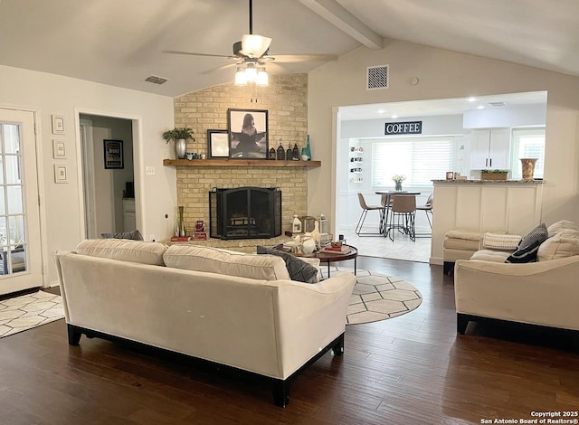 15115 Mission Oaks St, San Antonio, TX 78232 - living area featuring dark wood-type flooring, a ceiling fan, and a brick fireplace