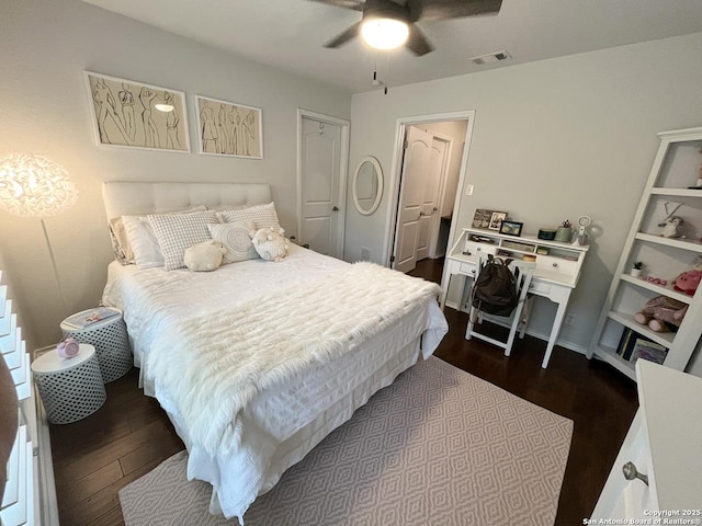 15115 Mission Oaks St, San Antonio, TX 78232 - bedroom with dark wood finished floors and ceiling fan