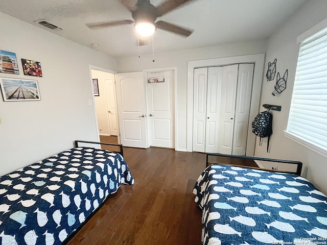15115 Mission Oaks St, San Antonio, TX 78232 - bedroom with wood finished floors, multiple windows, a closet, and ceiling fan