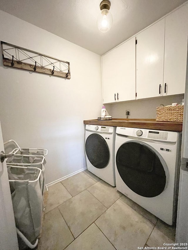 15115 Mission Oaks St, San Antonio, TX 78232 - washroom featuring cabinet space, independent washer and dryer, and light tile patterned flooring