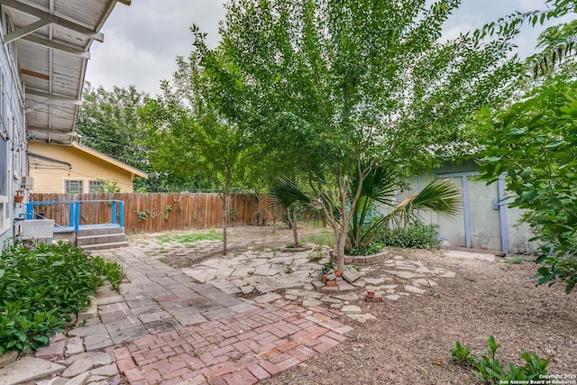 521 Kayton, San Antonio, TX 78210 - fenced backyard with a patio area