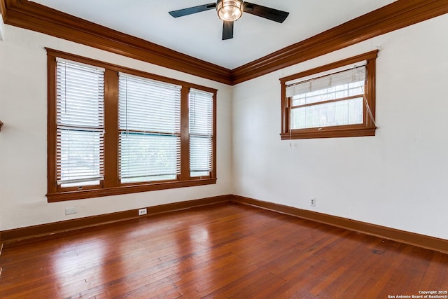 521 Kayton, San Antonio, TX 78210 - spare room with crown molding, a ceiling fan, and wood-type flooring