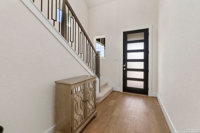 1845 Nettletree, New Braunfels, TX 78132 - foyer entrance featuring wood finished floors, stairs, and a towering ceiling