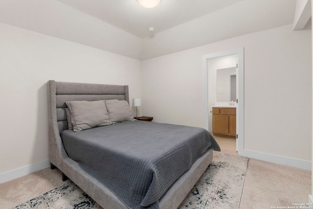 1845 Nettletree, New Braunfels, TX 78132 - bedroom with light colored carpet and connected bathroom