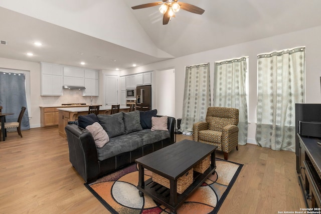 1845 Nettletree, New Braunfels, TX 78132 - living area with light wood-style floors, a ceiling fan, recessed lighting, and high vaulted ceiling