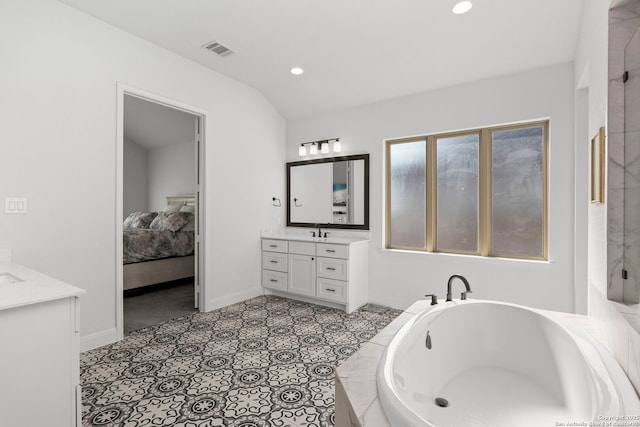 2905 Harvest Moon, Seguin, TX 78155 - bathroom featuring vanity, a tub, ensuite bathroom, and recessed lighting