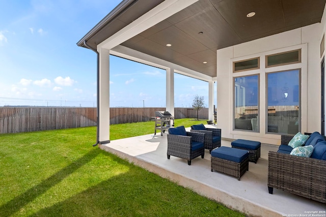 2905 Harvest Moon, Seguin, TX 78155 - fenced backyard with an outdoor hangout area, a patio, and a grill