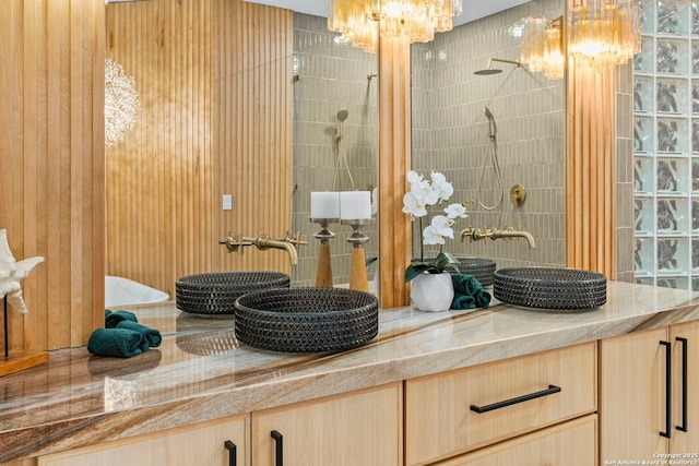 6 Turin Ct, San Antonio, TX 78257 - full bath with a chandelier, a tile shower, and double vanity