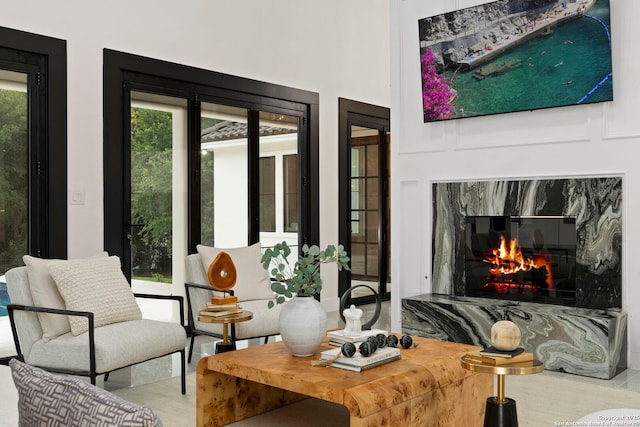 6 Turin Ct, San Antonio, TX 78257 - living area featuring a towering ceiling and a glass covered fireplace