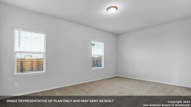 21039 Watercourse Way, San Antonio, TX 78266 - carpeted spare room featuring baseboards