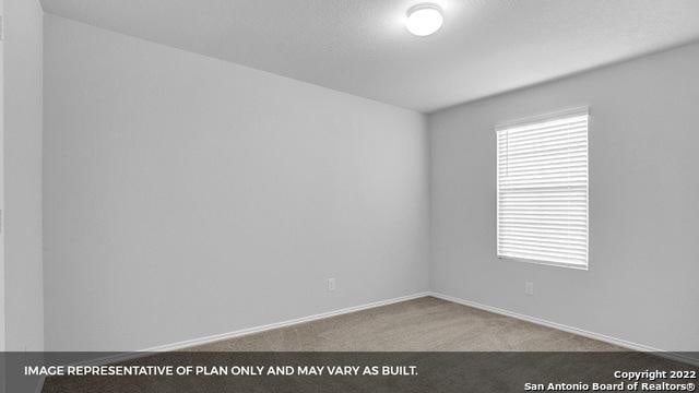 21039 Watercourse Way, San Antonio, TX 78266 - empty room with carpet and baseboards