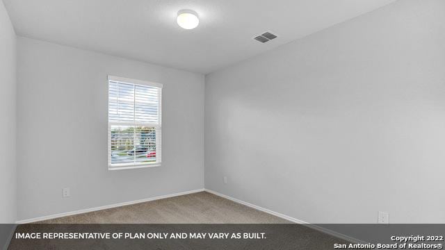 21039 Watercourse Way, San Antonio, TX 78266 - carpeted spare room with baseboards
