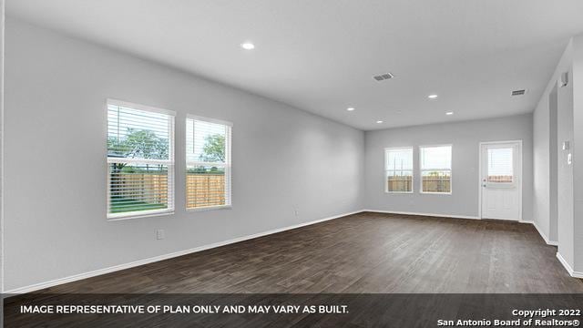 21039 Watercourse Way, San Antonio, TX 78266 - spare room featuring dark wood-style floors and recessed lighting