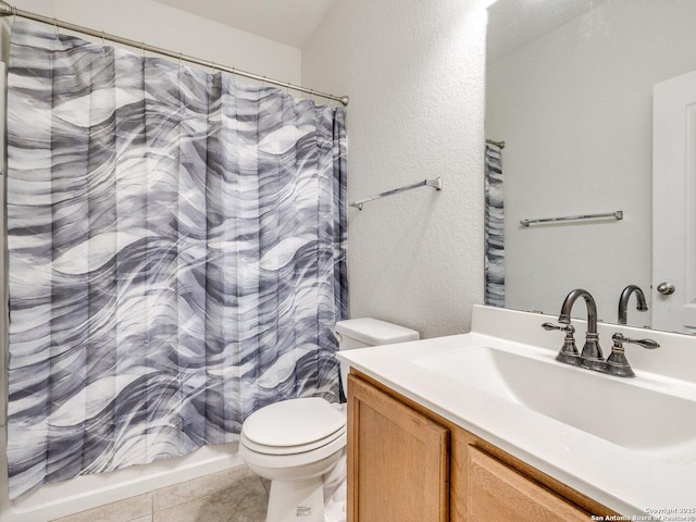 20127 Silver Strm, San Antonio, TX 78259 - bathroom featuring vanity, tile patterned floors, a textured wall, and shower / tub combo with curtain