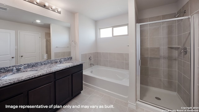 22716 Match Play, San Antonio, TX 78261 - bathroom featuring tile patterned floors, a garden tub, a shower stall, and double vanity
