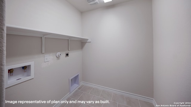 22716 Match Play, San Antonio, TX 78261 - washroom featuring gas dryer hookup, washer hookup, electric dryer hookup, and light tile patterned floors