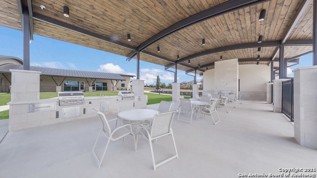 22716 Match Play, San Antonio, TX 78261 - view of patio with area for grilling, outdoor dining area, and a gazebo