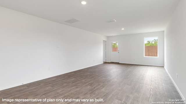 22926 Double Bogey, San Antonio, TX 78261 - unfurnished room featuring wood finished floors and recessed lighting