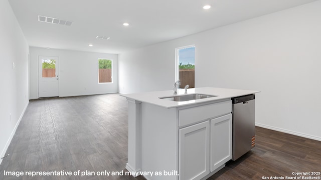 22926 Double Bogey, San Antonio, TX 78261 - kitchen with dishwasher, dark wood-type flooring, recessed lighting, light countertops, and an island with sink