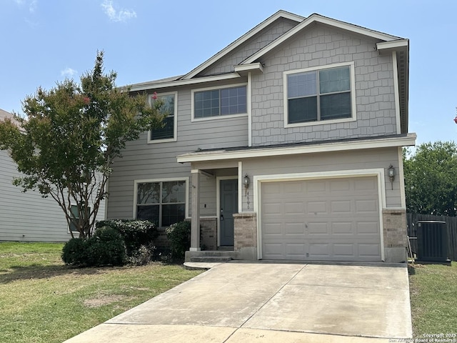 4606 Gambels Quail, Converse, TX 78109 - view of front of home with driveway, brick siding, and a garage