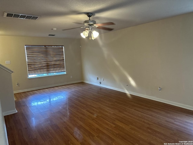 4606 Gambels Quail, Converse, TX 78109 - empty room with wood finished floors and a ceiling fan