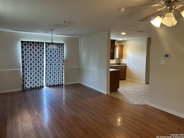 4606 Gambels Quail, Converse, TX 78109 - unfurnished room featuring wood finished floors and ceiling fan