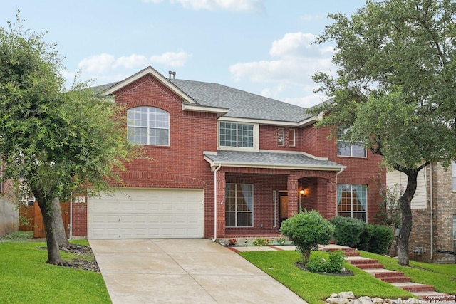 519 Catanbo, San Antonio, TX 78258 - traditional-style home with a garage, brick siding, concrete driveway, a shingled roof, and a front lawn