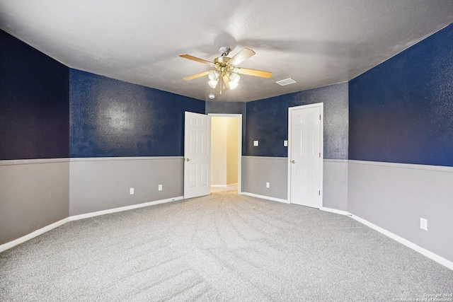 519 Catanbo, San Antonio, TX 78258 - unfurnished bedroom with ceiling fan and carpet floors
