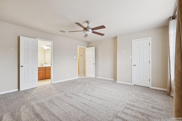 519 Catanbo, San Antonio, TX 78258 - unfurnished bedroom with light carpet, ensuite bathroom, and a ceiling fan
