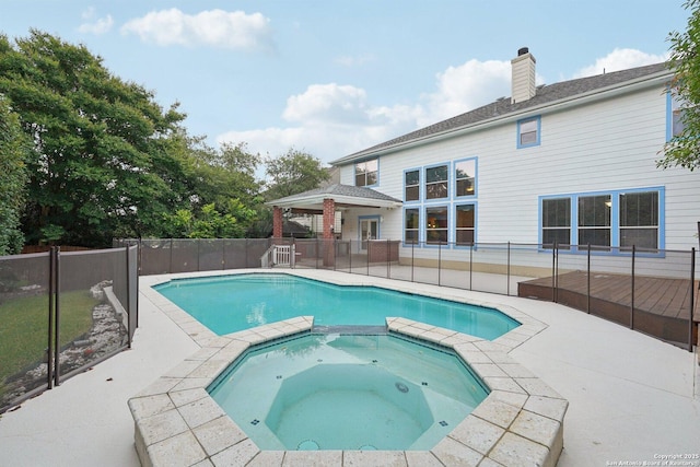 519 Catanbo, San Antonio, TX 78258 - view of swimming pool with a pool with connected hot tub and a patio