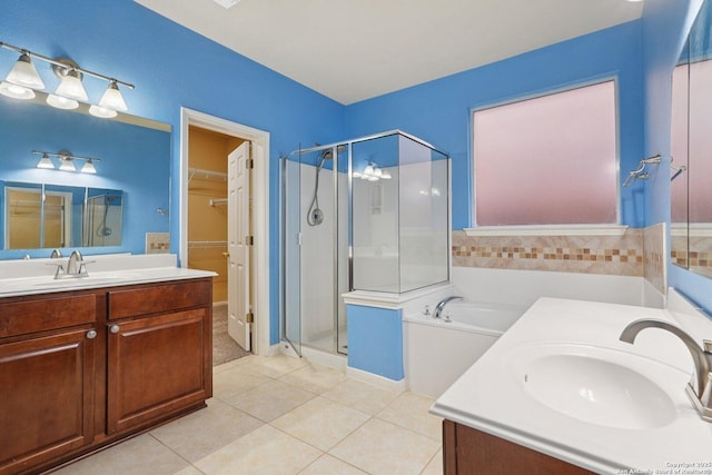 519 Catanbo, San Antonio, TX 78258 - full bath featuring a shower stall, tile patterned flooring, a garden tub, and two vanities
