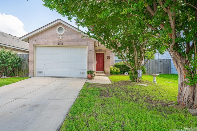11002 Stagwood Pass, San Antonio, TX 78254 - view of front of property with brick siding, driveway, and a garage